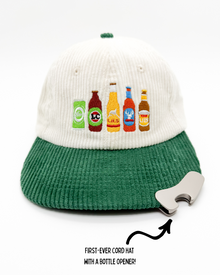 Off-white knit cap with green brim, embroidered beer bottles, included bottle opener