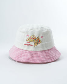 White and pink bucket hat with fairy bread patch and ribbed knit texture