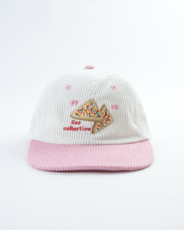 Kids fairy bread cap with white striped crown, pink brim, embroidered triangle design