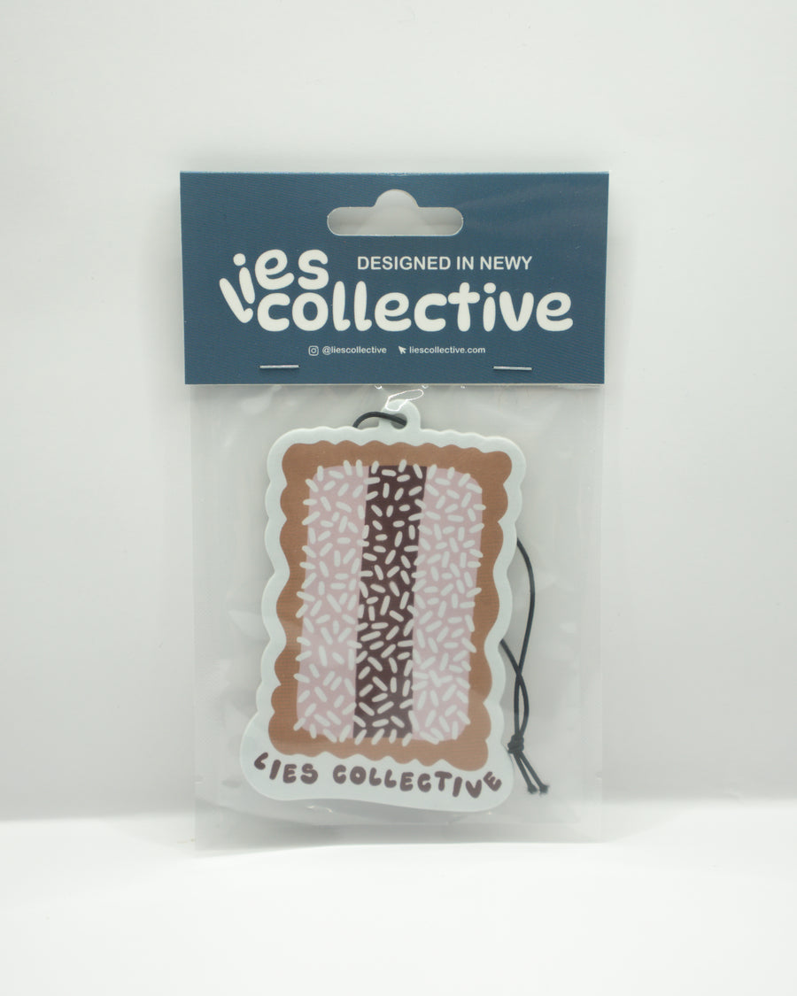 Air freshener tag in clear blister pack with brown and gray striped design