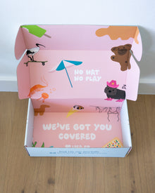 Pink and pastel cardboard box with animal illustrations and open top lid
